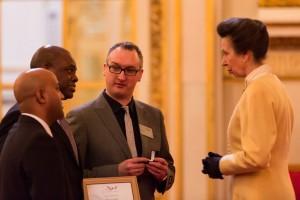 Donovan (second left) in conversation with Princess Anne