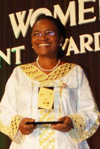 Prof. Mwaikambo receiving a Tanzanian Woman of Achievement Award in 2009