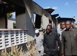 Prime Minister Mizengo Pinda visits the fire damaged courts in Mtwara following the rioting - photo State House